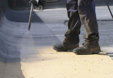Coating systems over Little Rock spray foam roof systems